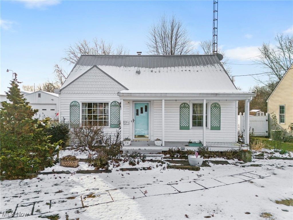 4870 15th Street Southwest Canton, OH 44710 - Photo 1 of 36 View of front facade featuring a porch and a metal roof