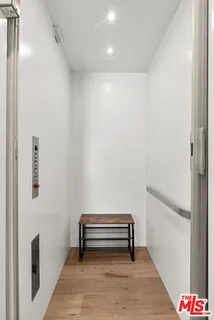 a hallway with a bench