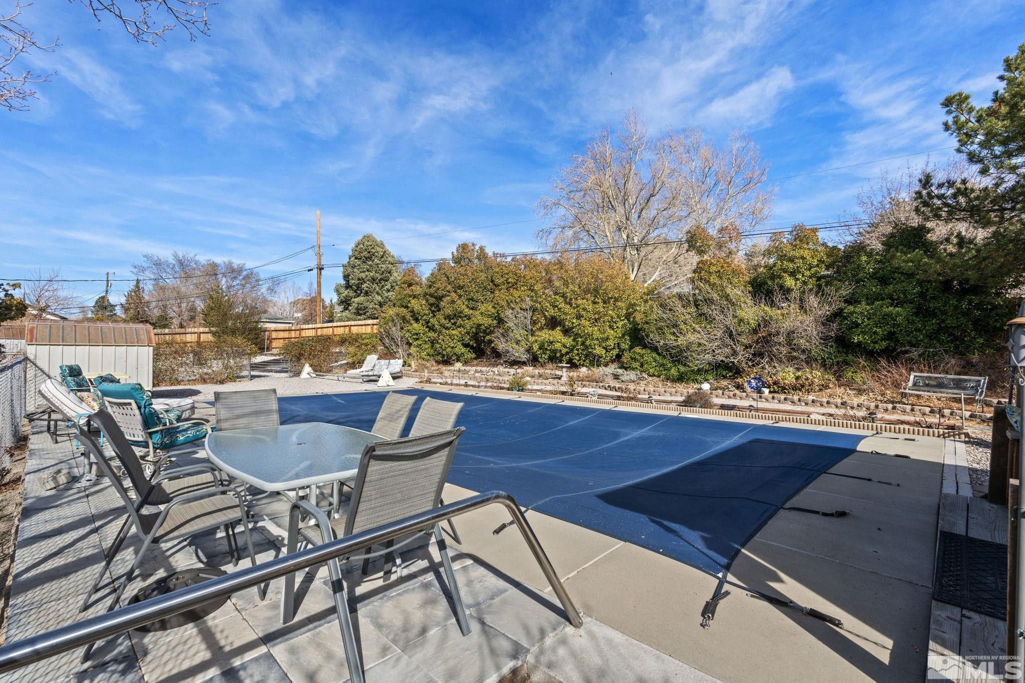 14440 Rim Rock Drive Reno, NV 89521 - Photo 36 of 39 a view of a chairs and table on the terrace