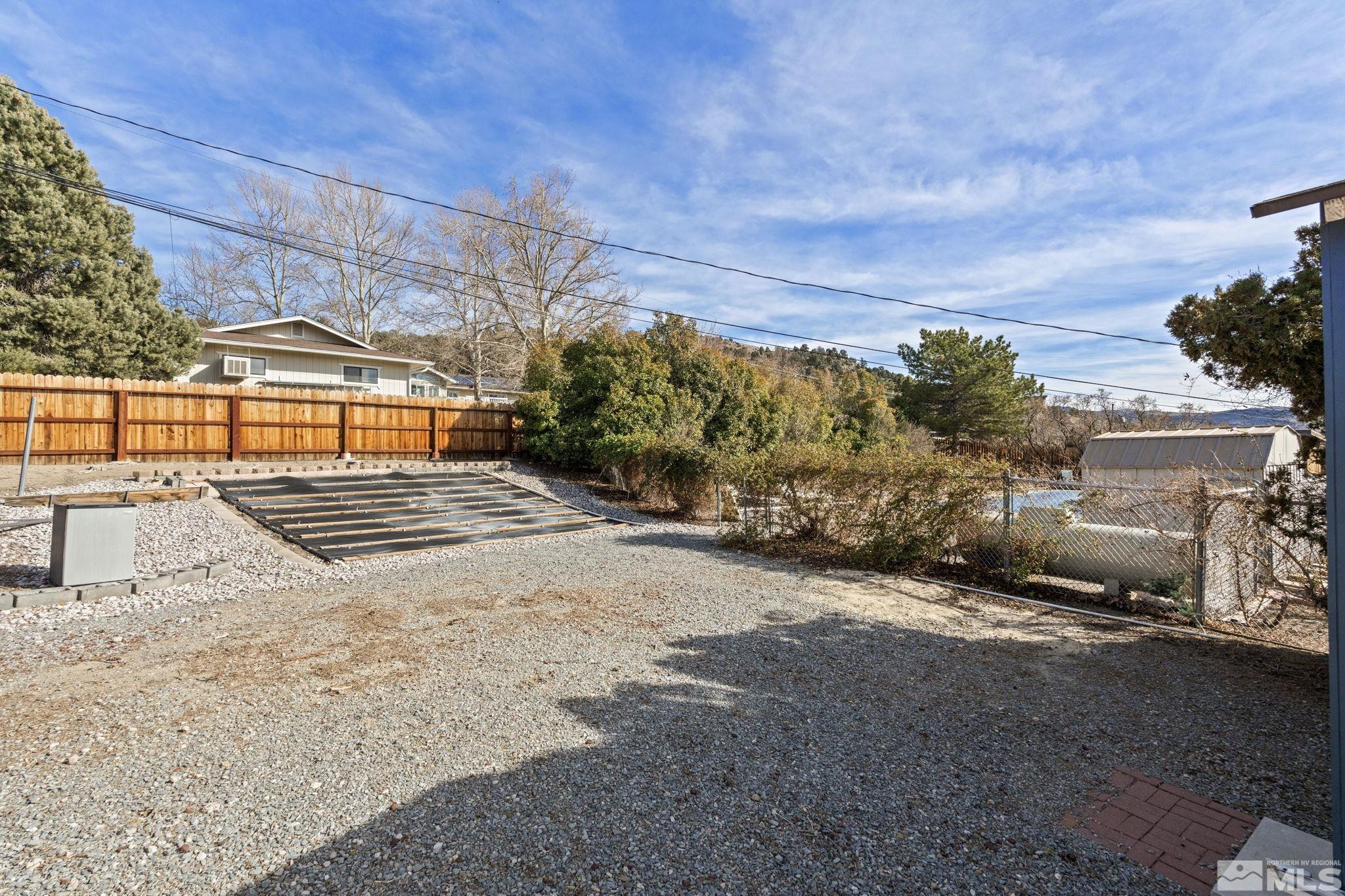 14440 Rim Rock Drive Reno, NV 89521 - Photo 38 of 39 a view of a backyard with sitting area