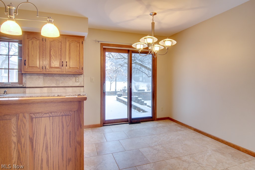 3383 Bancroft Road Akron, OH 44333 - Photo 10 of 33 Sliding door leads to top tier of patio.