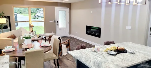 a bathroom with a bathtub and a window