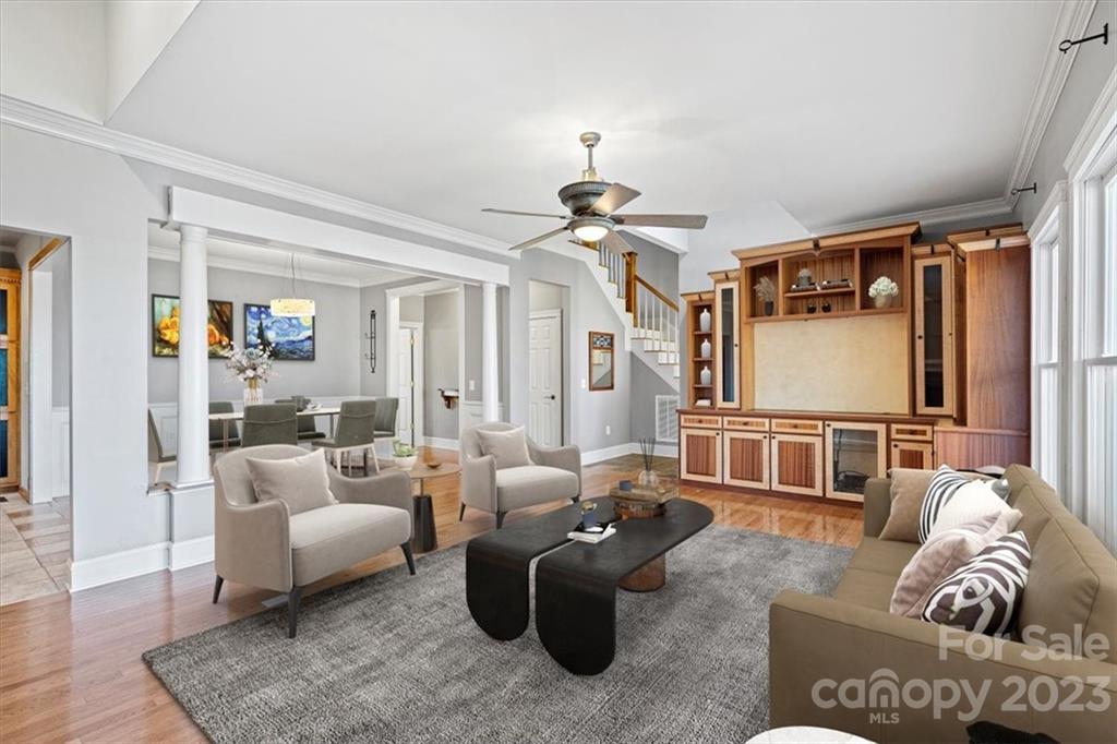 7275 Davidson Highway Concord, NC 28027 - Photo 12 of 47 a living room with furniture ceiling fan and a rug