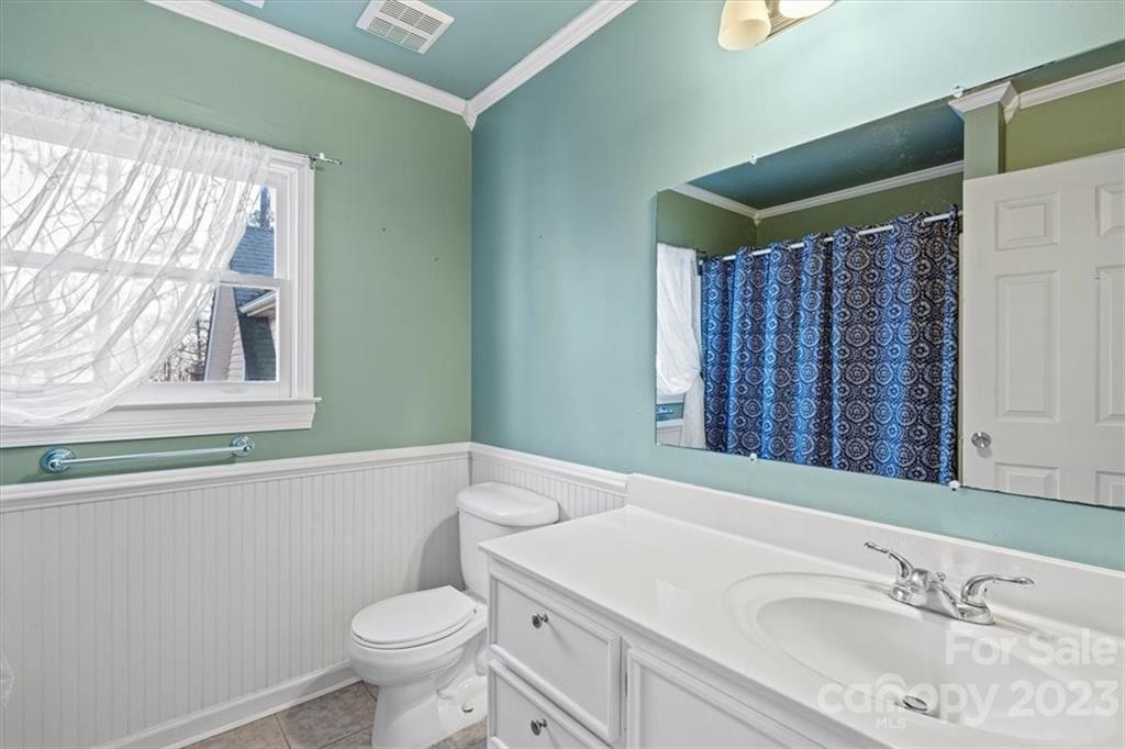 7275 Davidson Highway Concord, NC 28027 - Photo 21 of 47 a bathroom with a sink toilet and window