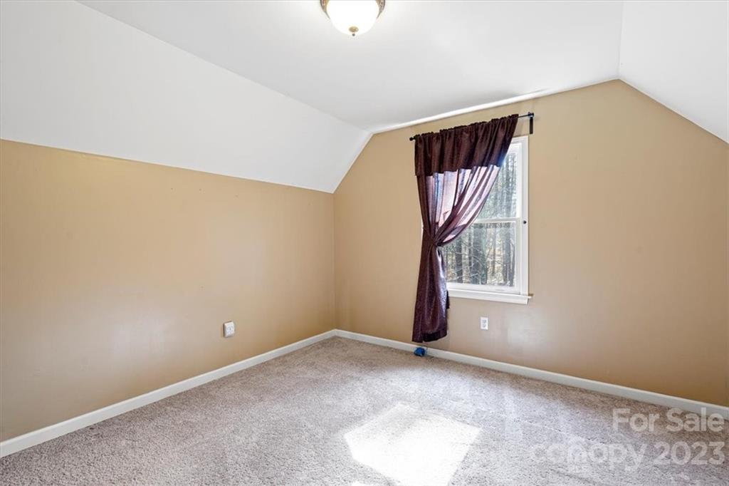 7275 Davidson Highway Concord, NC 28027 - Photo 22 of 47 a view of an empty room with a window