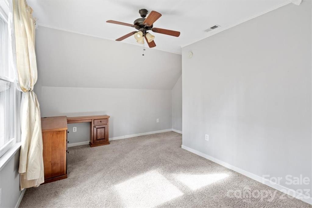 7275 Davidson Highway Concord, NC 28027 - Photo 28 of 47 a view of a livingroom with a ceiling fan and window