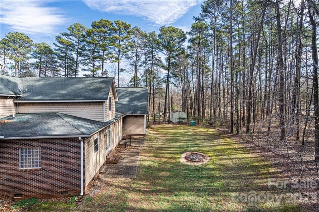 7275 Davidson Highway Concord, NC 28027 - Photo 37 of 47 a view of swimming pool with an outdoor space and seating area