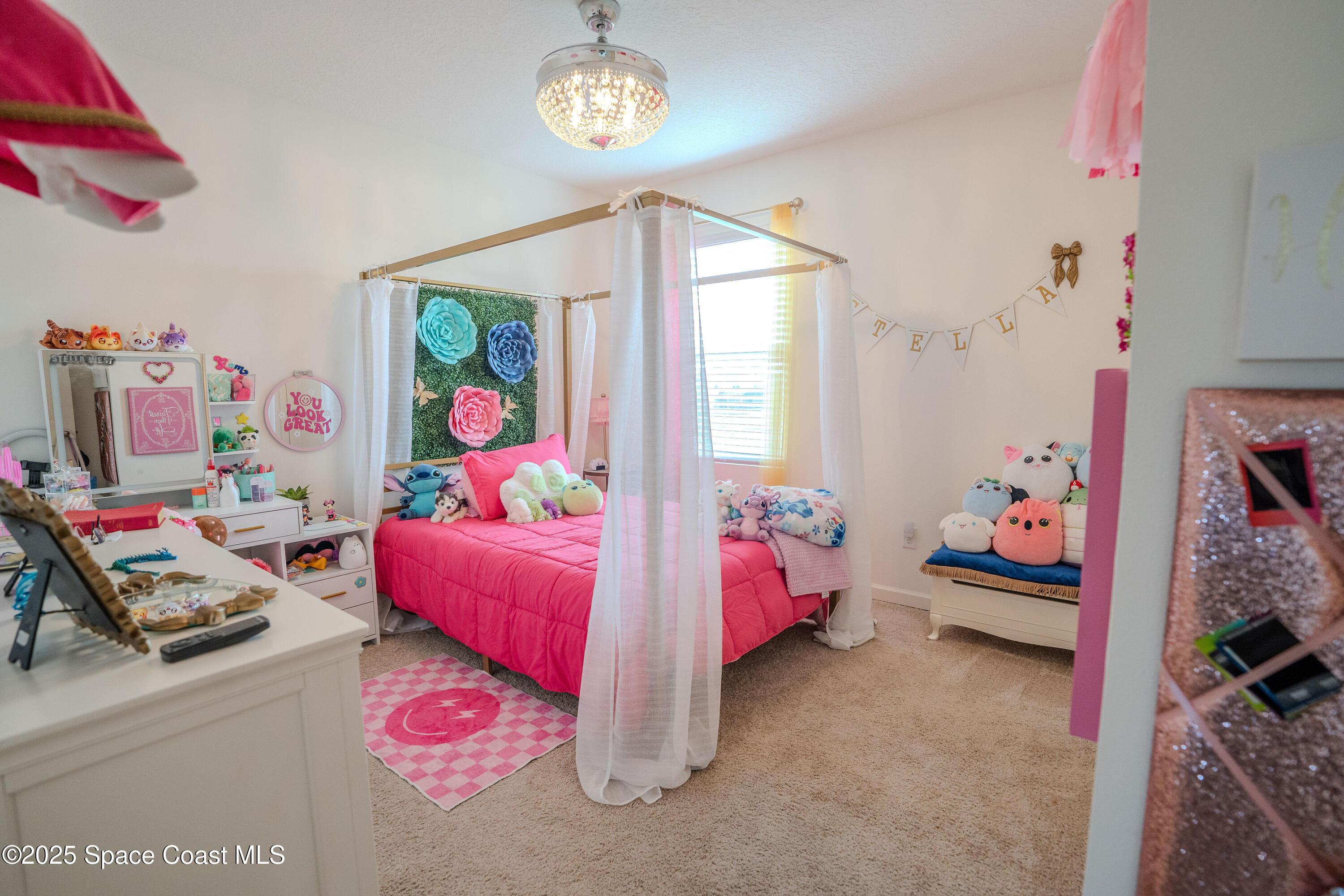 3409 Burrowing Owl Mims, FL 32754 - Photo 23 of 36 a bedroom with bed and a workspace