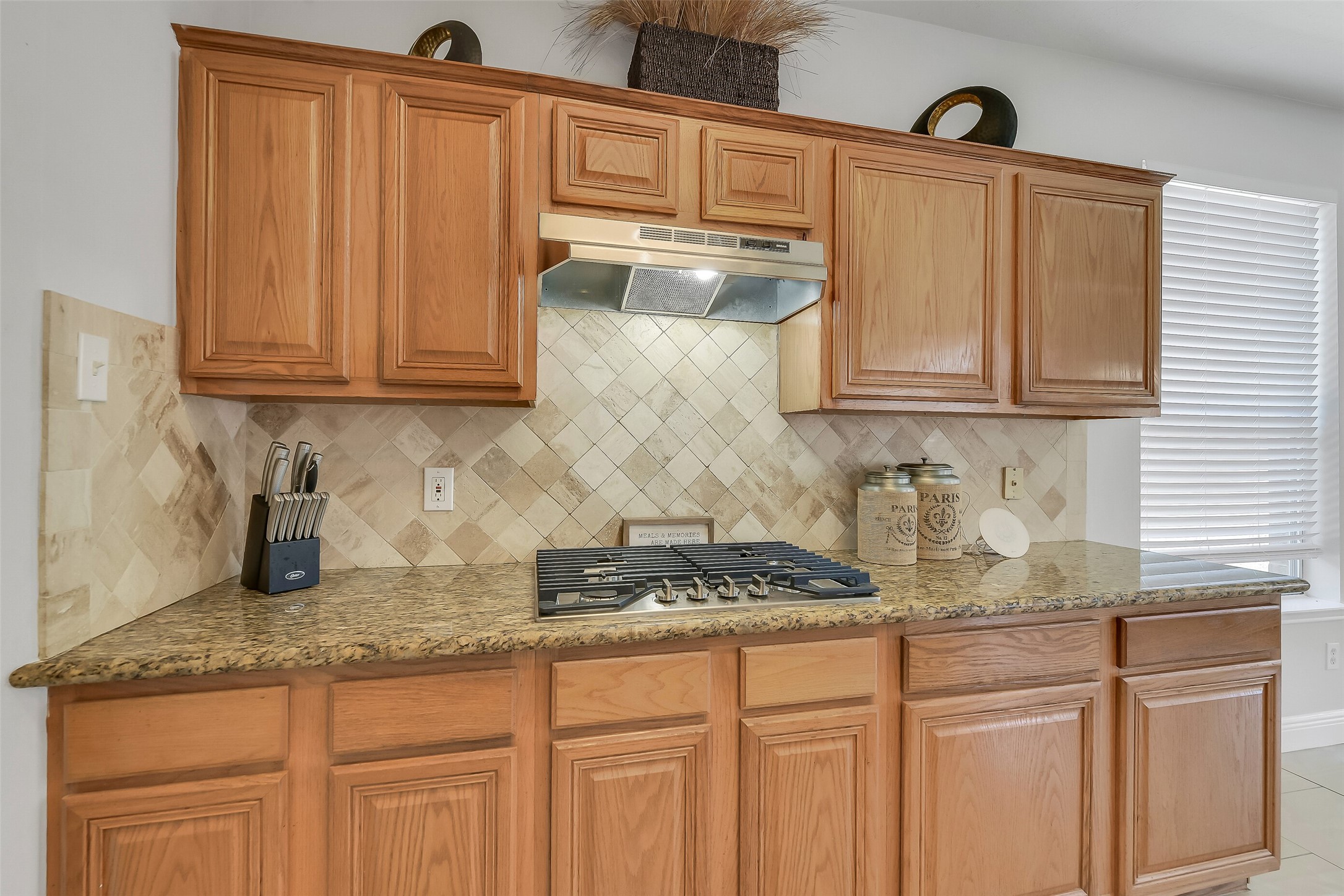 12426 Shadowpoint Drive Houston, TX 77082 - Photo 13 of 42 a kitchen with granite countertop a sink cabinets and stainless steel appliances