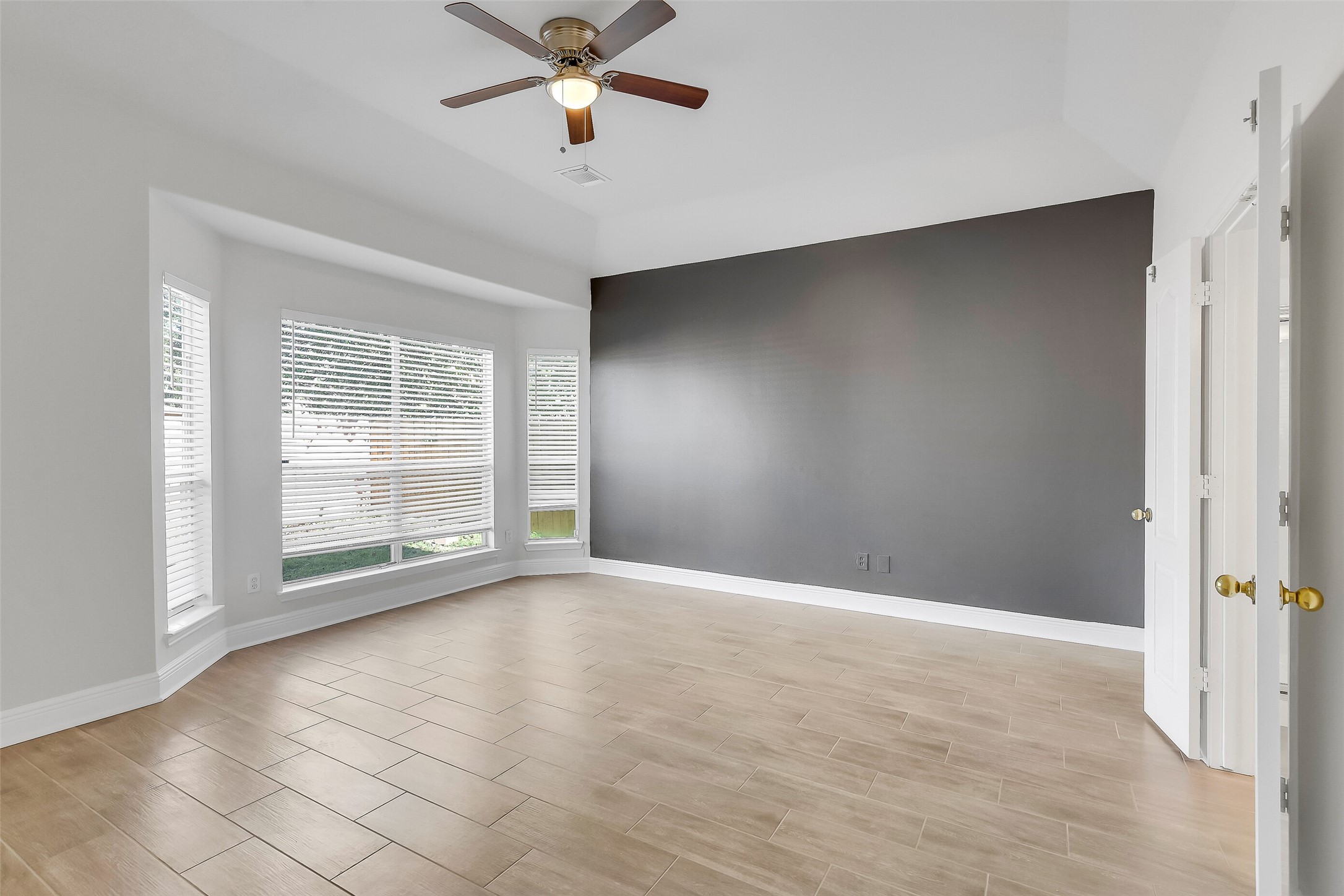 12426 Shadowpoint Drive Houston, TX 77082 - Photo 16 of 42 a view of an empty room with a window