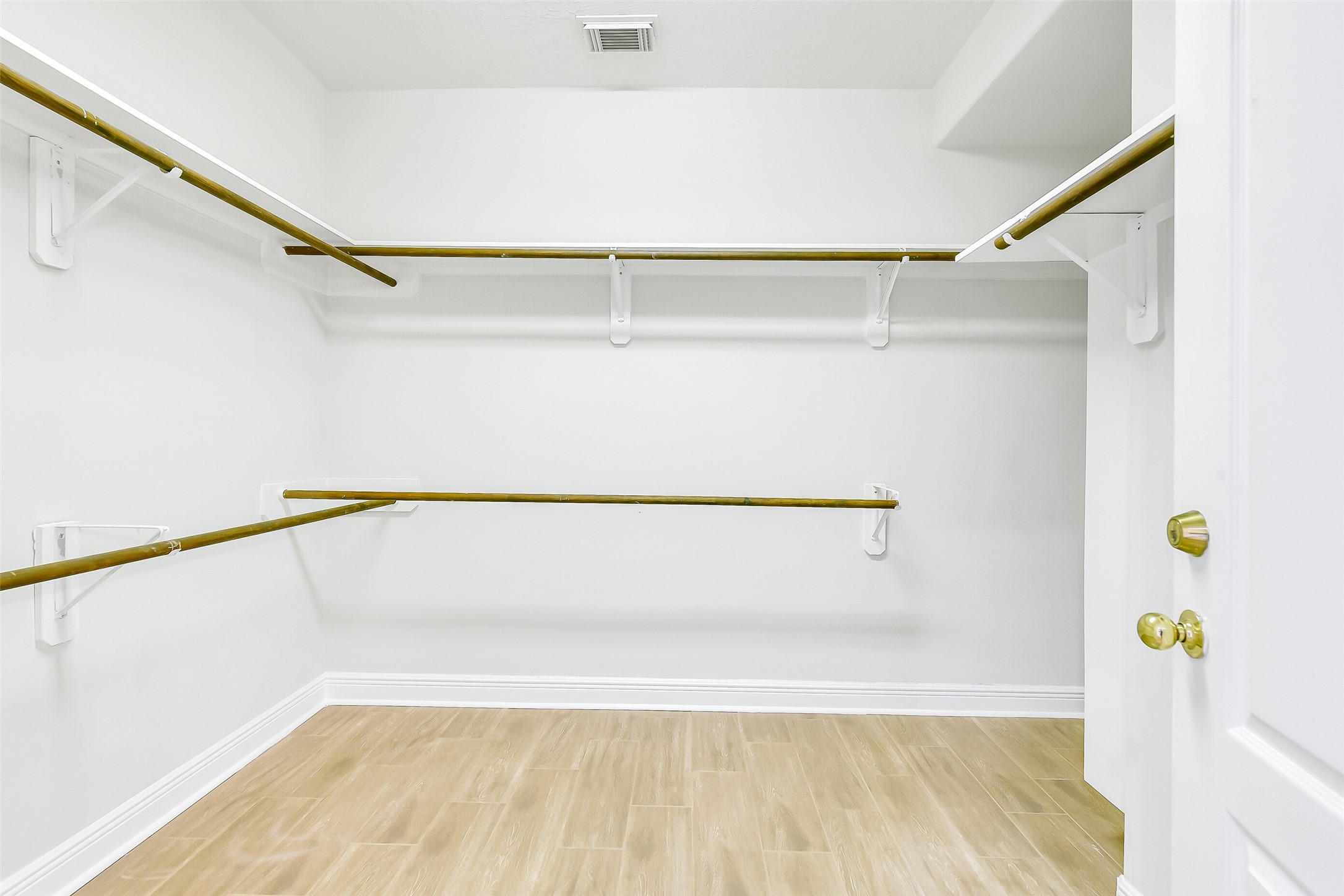 12426 Shadowpoint Drive Houston, TX 77082 - Photo 21 of 42 a view of walk in closet with window and plants