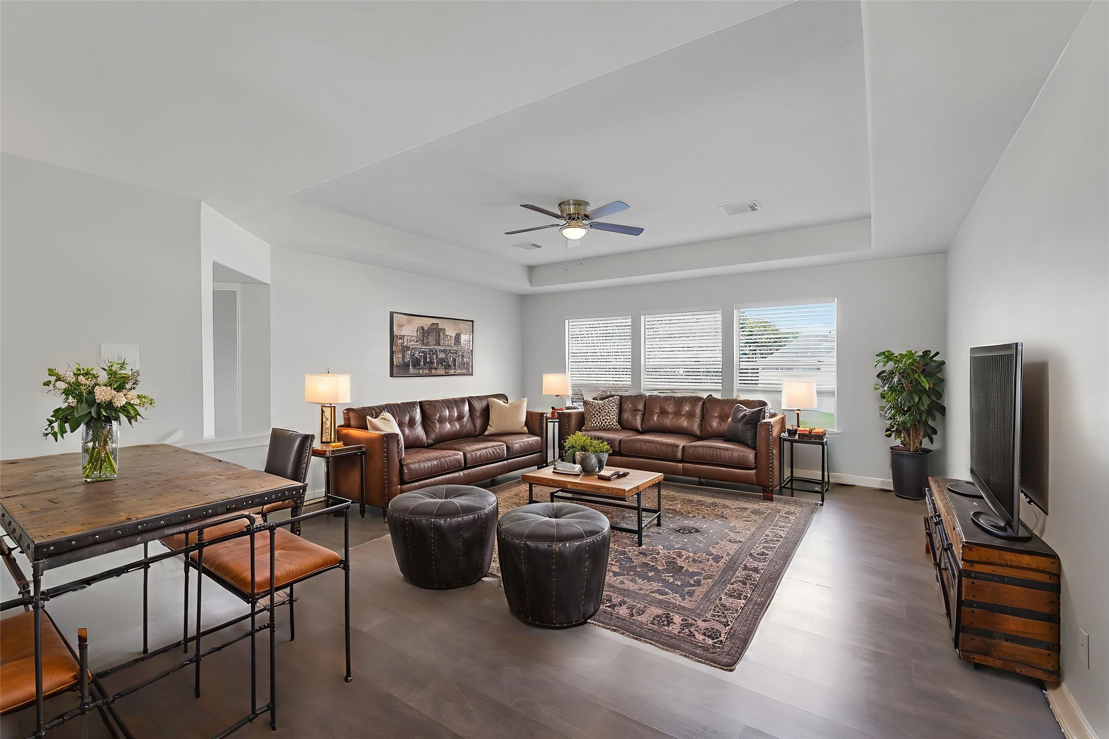 12426 Shadowpoint Drive Houston, TX 77082 - Photo 23 of 42 a living room with furniture a flat screen tv and a window
