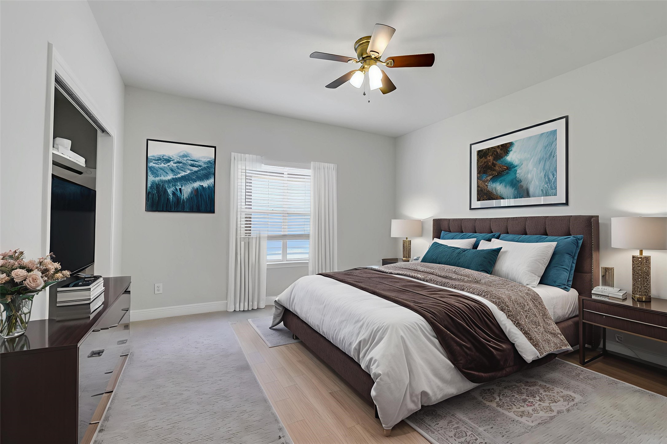 12426 Shadowpoint Drive Houston, TX 77082 - Photo 26 of 42 a spacious bedroom with a large bed and a chandelier