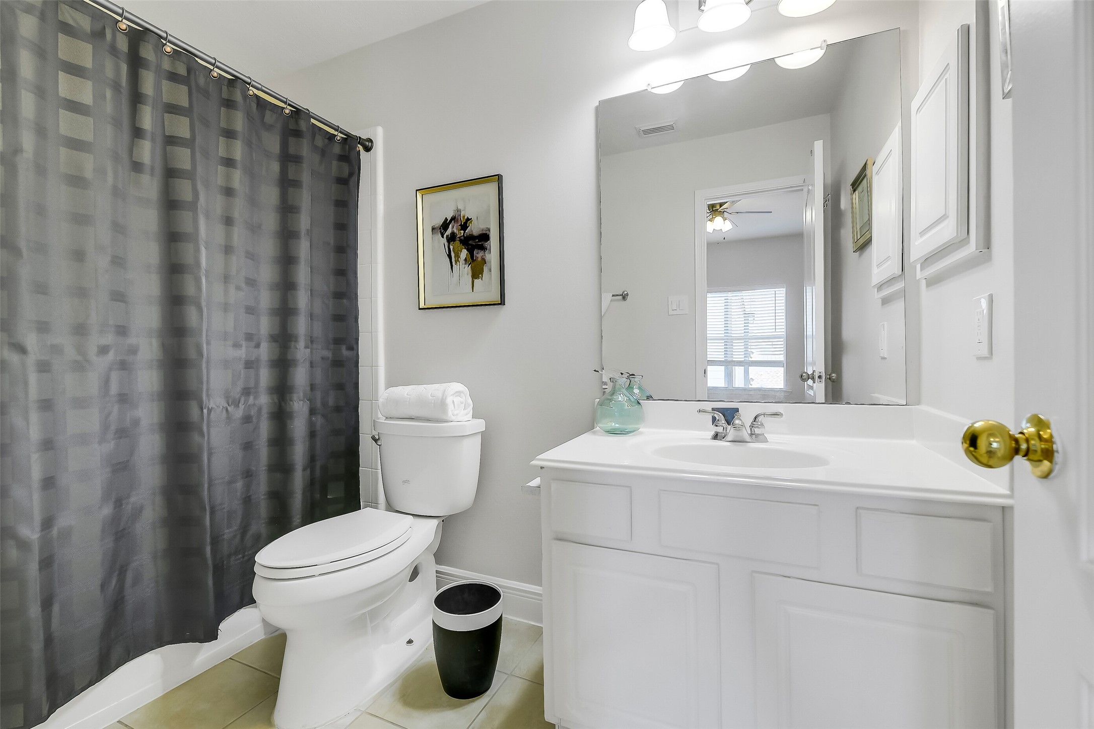 12426 Shadowpoint Drive Houston, TX 77082 - Photo 28 of 42 a bathroom with a sink toilet and mirror