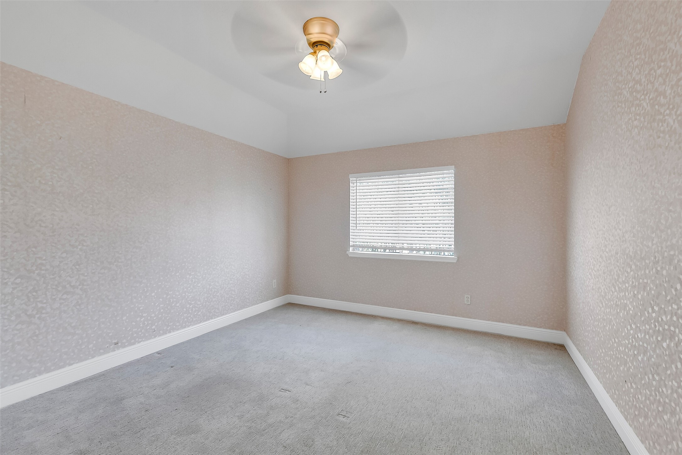 12426 Shadowpoint Drive Houston, TX 77082 - Photo 32 of 42 an empty room with a window