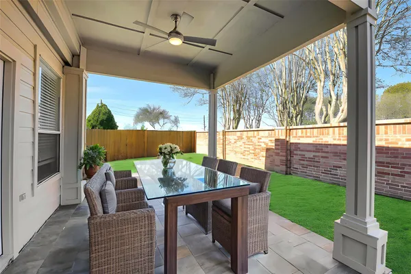 a view of an outdoor space with furniture