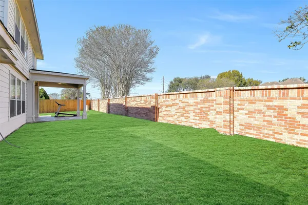 a view of a backyard with garden