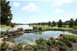 12426 Shadowpoint Drive Houston, TX 77082 - Photo 42 of 42 a view of a lake with green space
