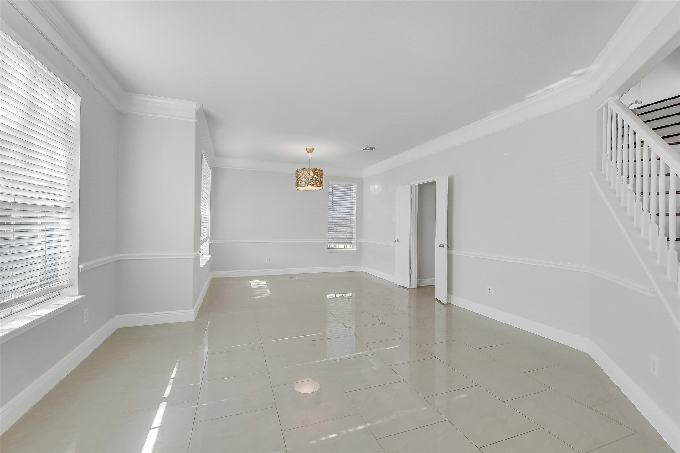 12426 Shadowpoint Drive Houston, TX 77082 - Photo 5 of 42 a view of an empty room with a window