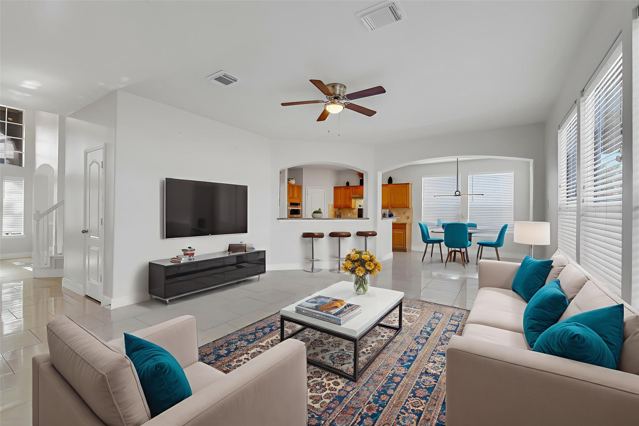 12426 Shadowpoint Drive Houston, TX 77082 - Photo 7 of 42 a living room with furniture and a flat screen tv