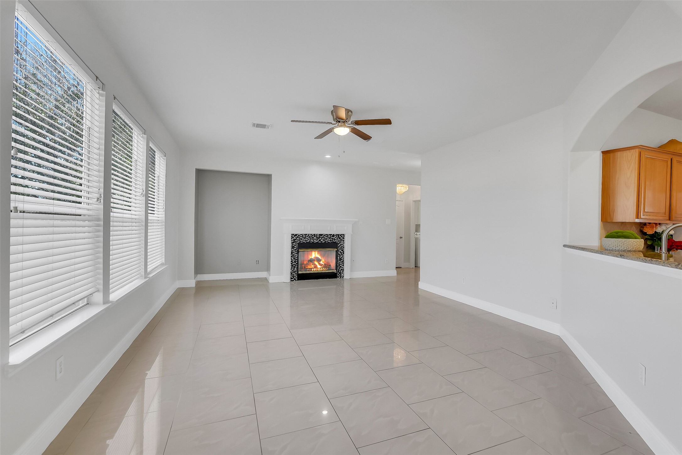 12426 Shadowpoint Drive Houston, TX 77082 - Photo 9 of 42 wooden floor in an empty room with a window