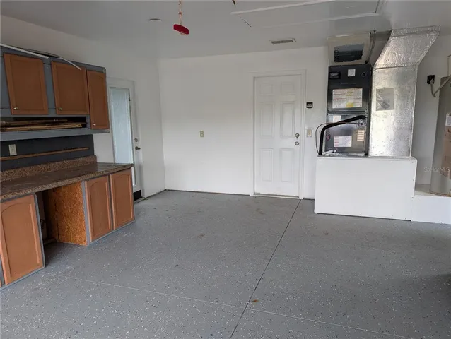 a view of a back yard of the house