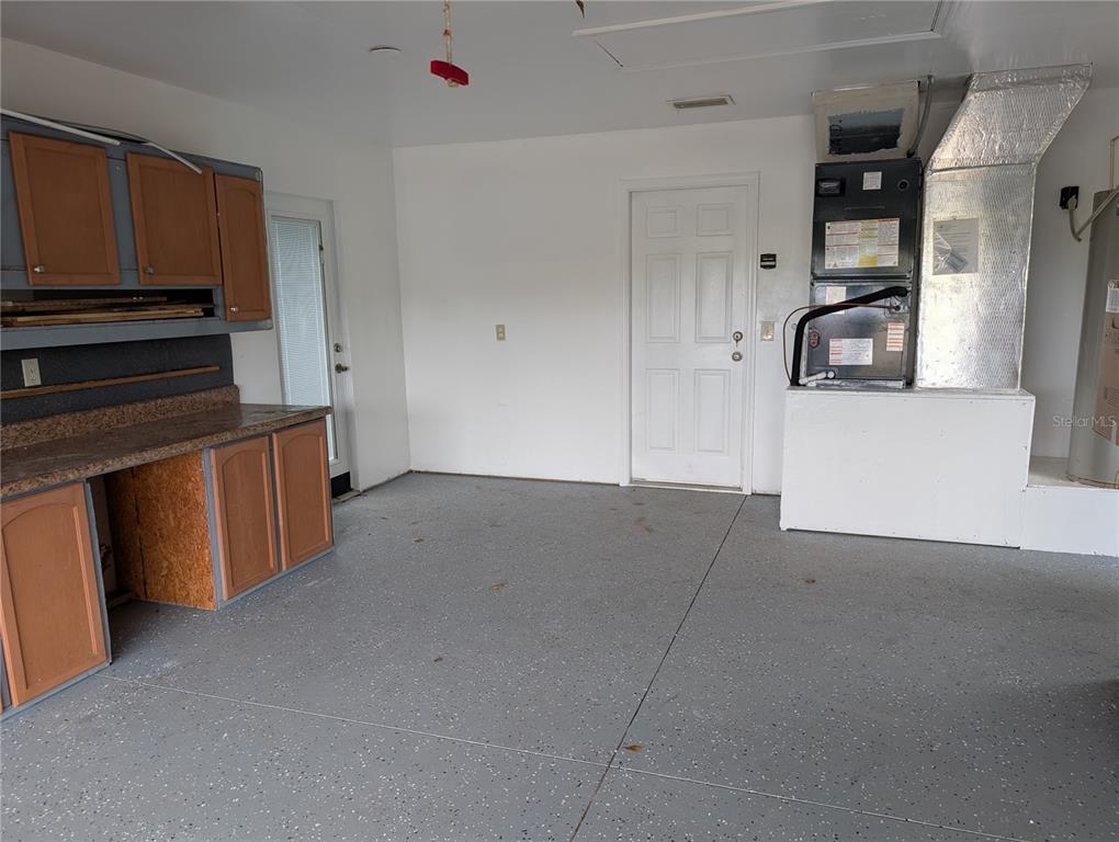 12022 Southeast Sunset Harbor Road Weirsdale, FL 32195 - Photo 15 of 17 a view of a storage & utility room