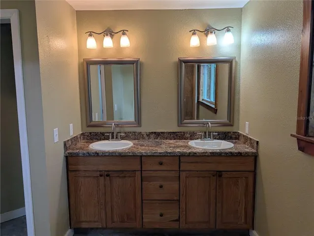 a bathroom with a shower and a toilet