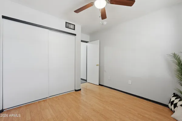 a bathroom with a sink toilet and a mirror