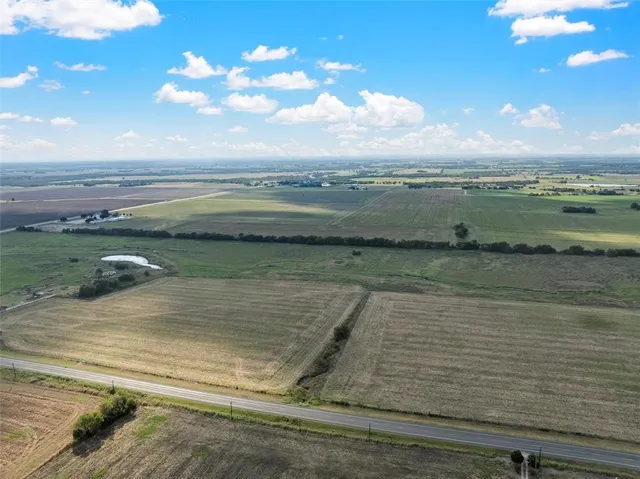 a view of a lake from a balcony