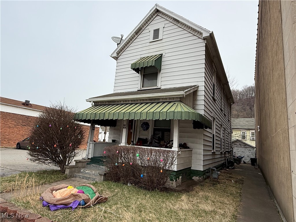 800 Main Street Follansbee, WV 26037 - Photo 6 of 20 View of front of house with covered porch