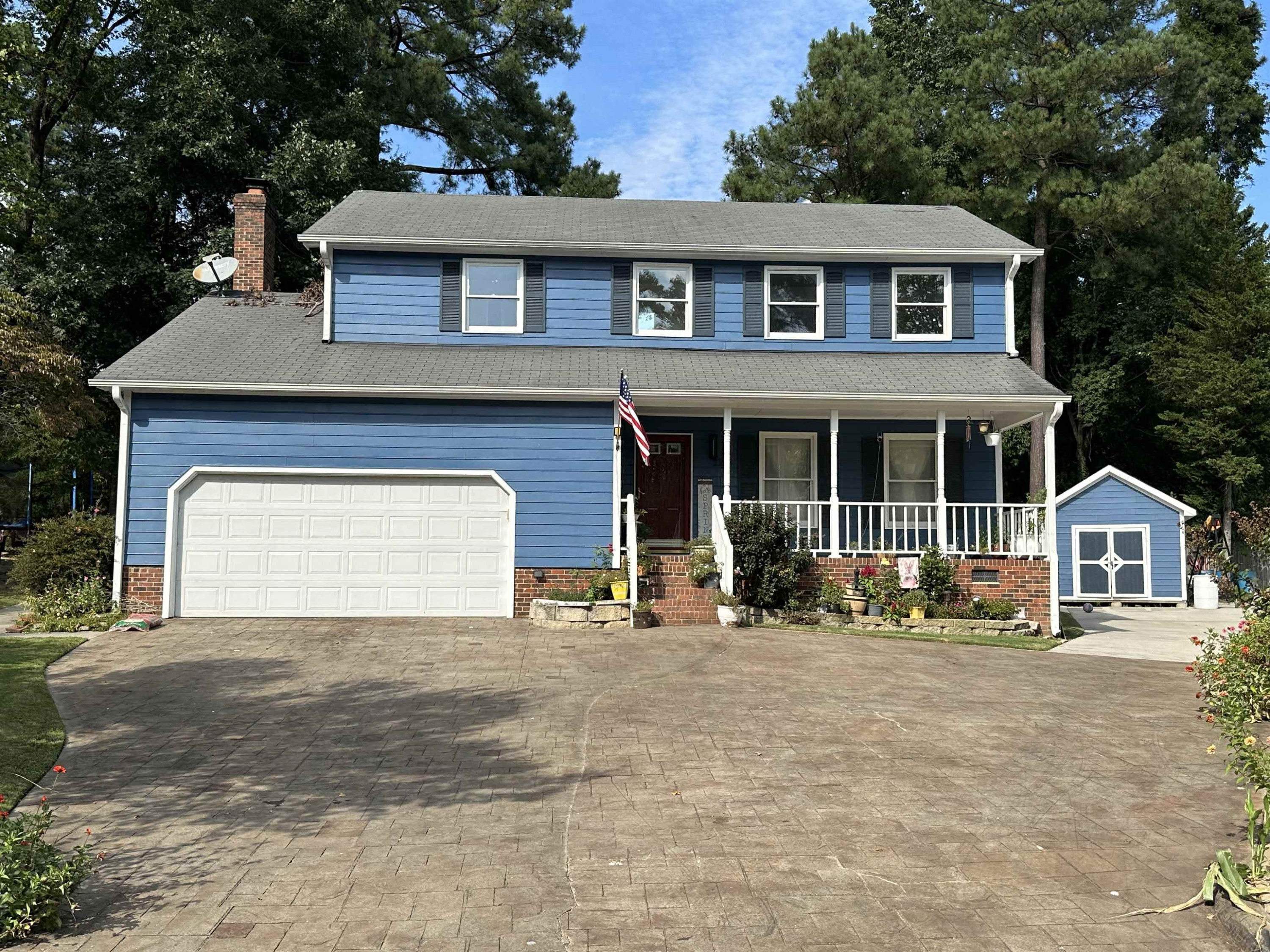2208 Dobbin Place Raleigh, NC 27604 - Photo 1 of 42 a front view of a house with a yard
