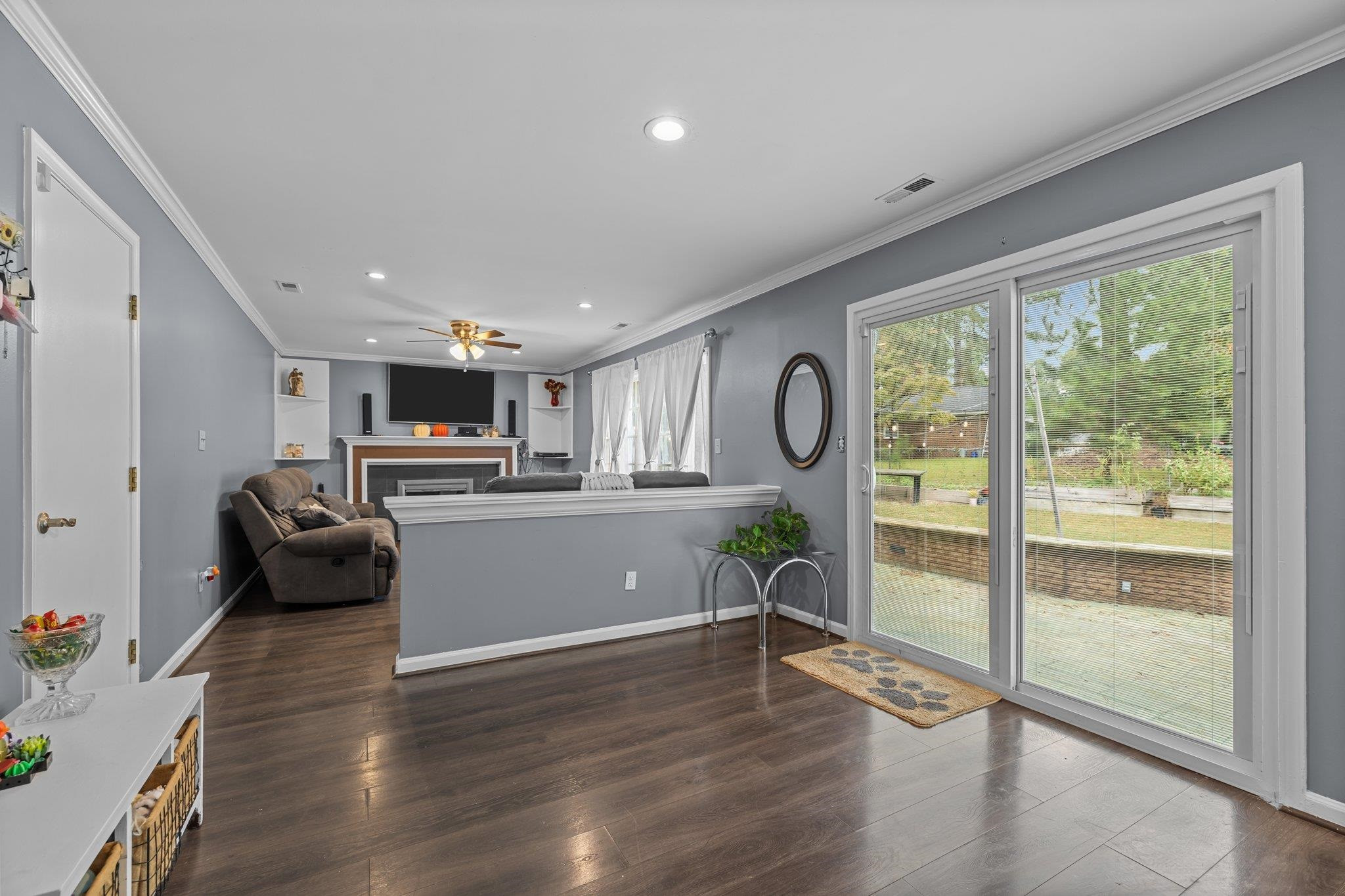2208 Dobbin Place Raleigh, NC 27604 - Photo 16 of 42 a living room with furniture and a flat screen tv
