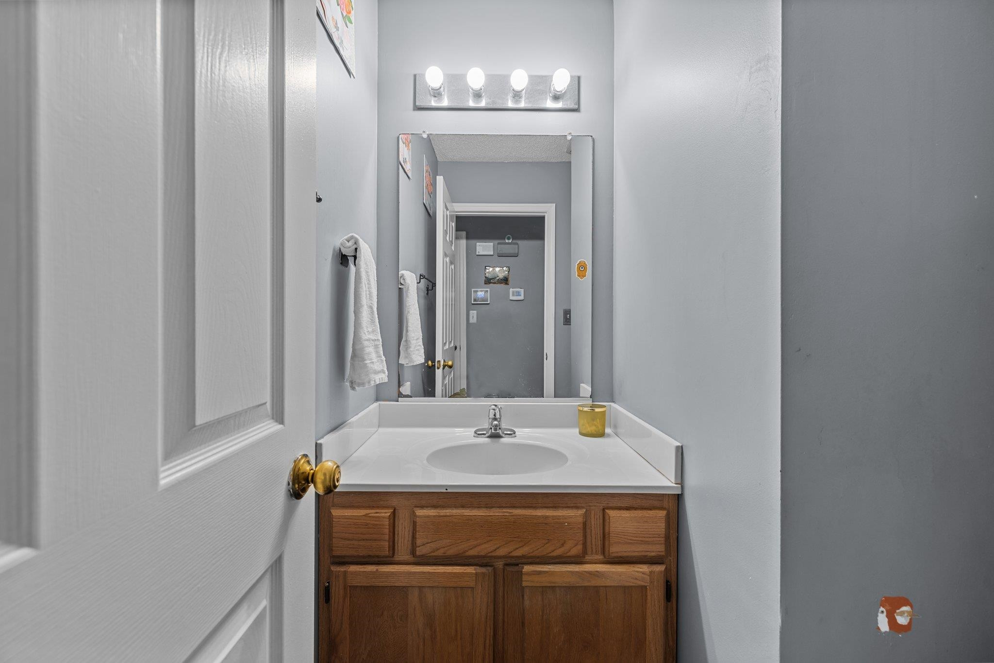 2208 Dobbin Place Raleigh, NC 27604 - Photo 20 of 42 a bathroom with a sink and a mirror