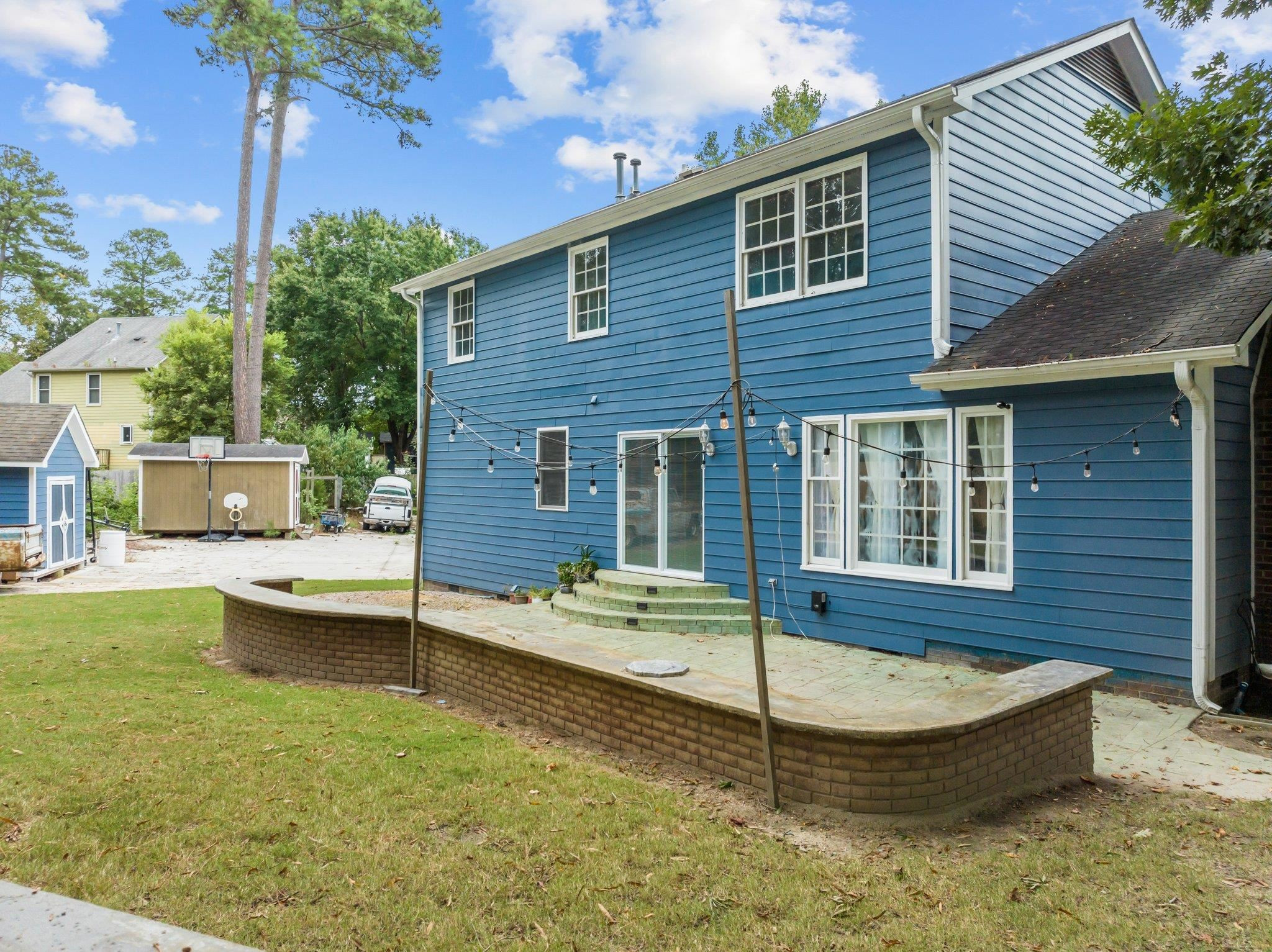 2208 Dobbin Place Raleigh, NC 27604 - Photo 33 of 42 a view of a house with pool and chairs
