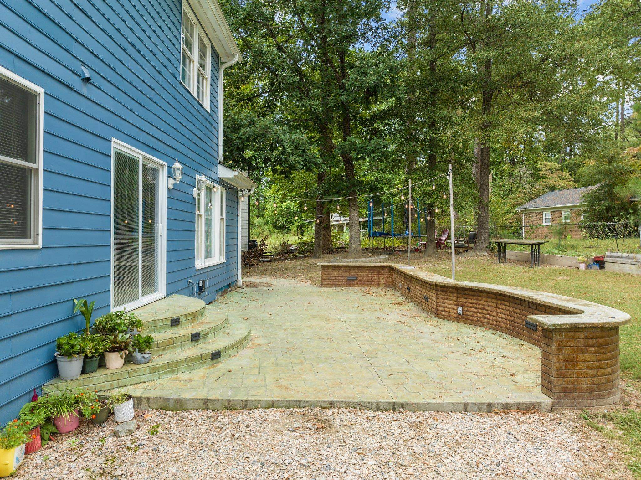 2208 Dobbin Place Raleigh, NC 27604 - Photo 35 of 42 a view of a house with a yard