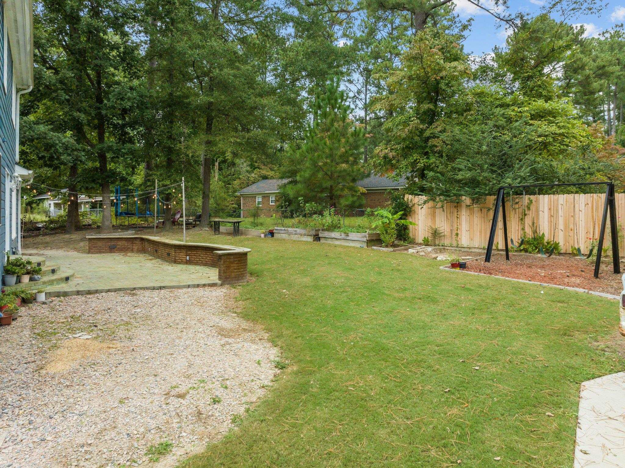 2208 Dobbin Place Raleigh, NC 27604 - Photo 36 of 42 a view of backyard with green space
