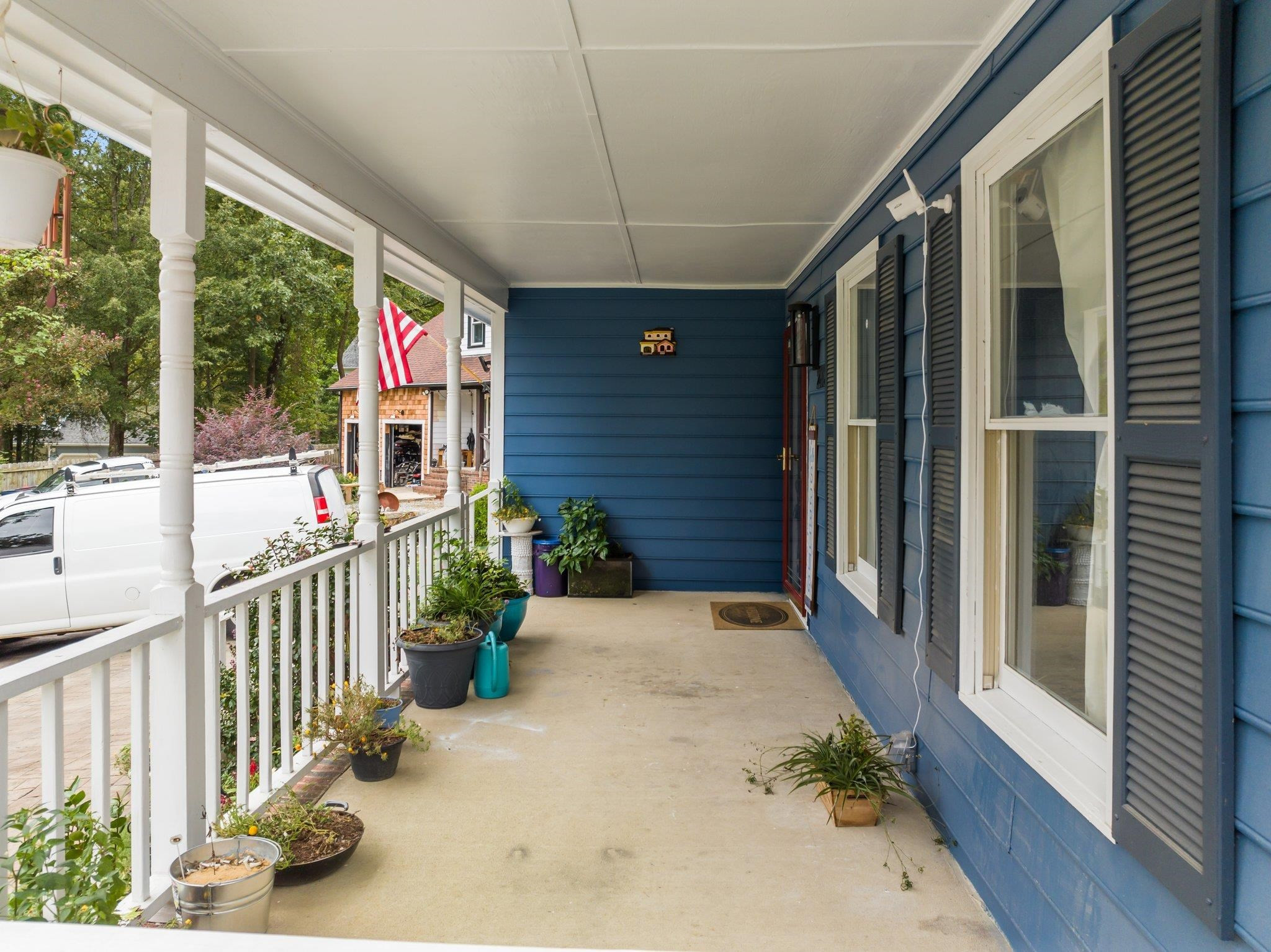 2208 Dobbin Place Raleigh, NC 27604 - Photo 6 of 42 a view of a porch with wooden floor