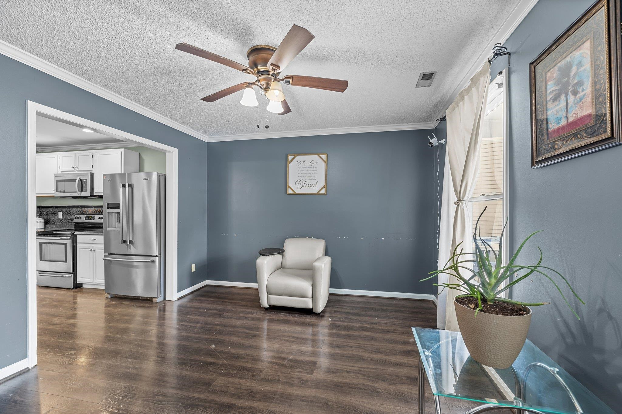 2208 Dobbin Place Raleigh, NC 27604 - Photo 9 of 42 a view of a dining room with furniture and wooden floor