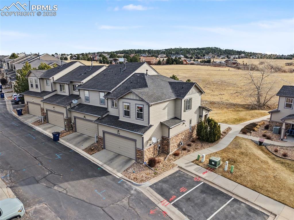 17063 Blue Mist Grove Monument, CO 80132 - Photo 26 of 33 an aerial view of a house with a ocean view