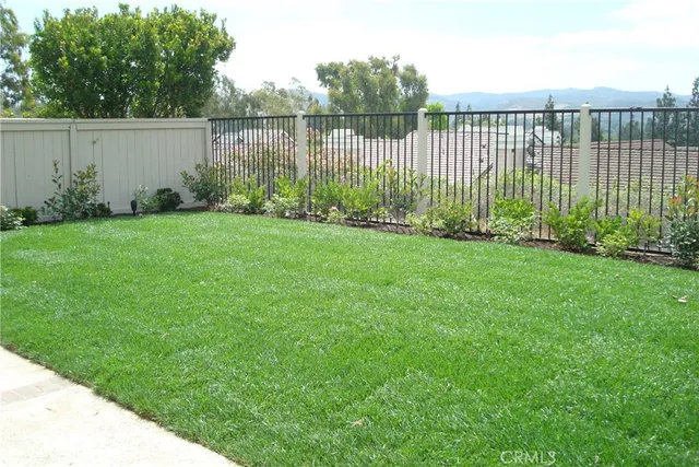 a view of a backyard with garden