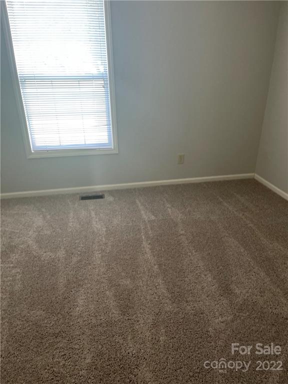 708 Patrick Road Gastonia, NC 28056 - Photo 15 of 15 an empty room with a window