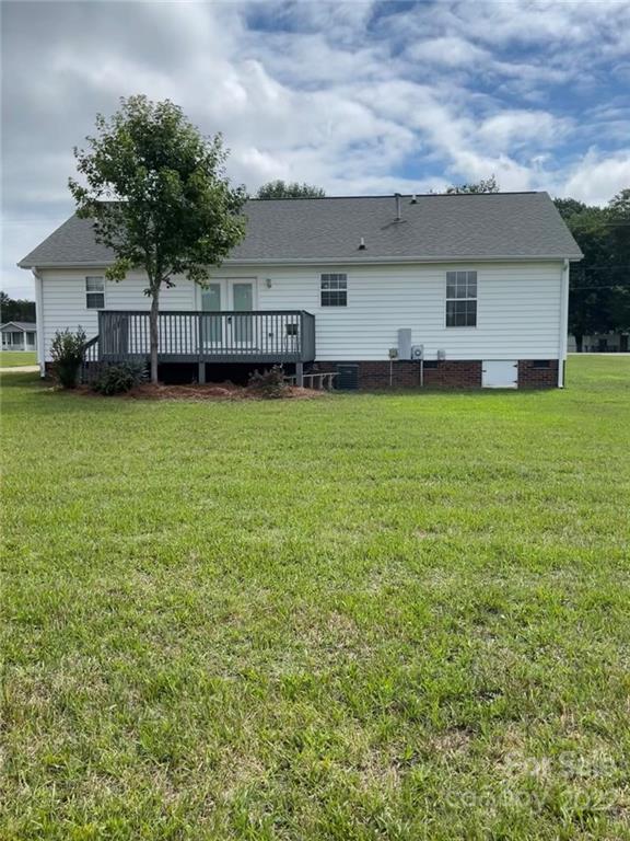 708 Patrick Road Gastonia, NC 28056 - Photo 4 of 15 a front view of a house with a garden