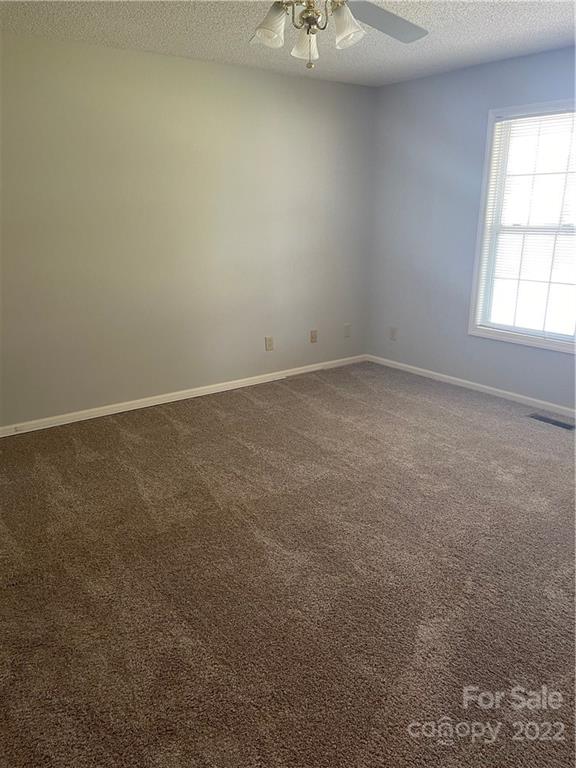 708 Patrick Road Gastonia, NC 28056 - Photo 10 of 15 an empty room with a window