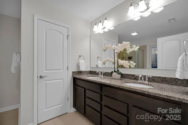 a white bath tub sitting next to a window