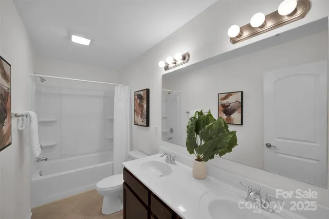 a kitchen with a sink cabinets and a window