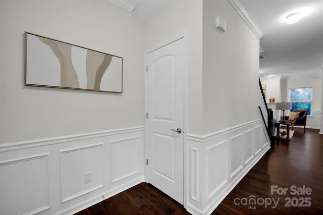 a view of a hallway with staircase