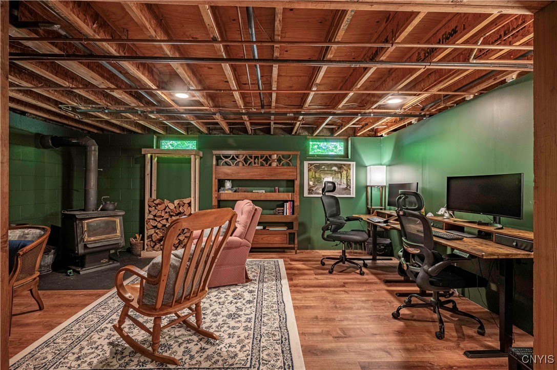 2414 South Shore Road Webb, NY 13420 - Photo 21 of 34 Office - Sitting Area with Wood-Burning Stove