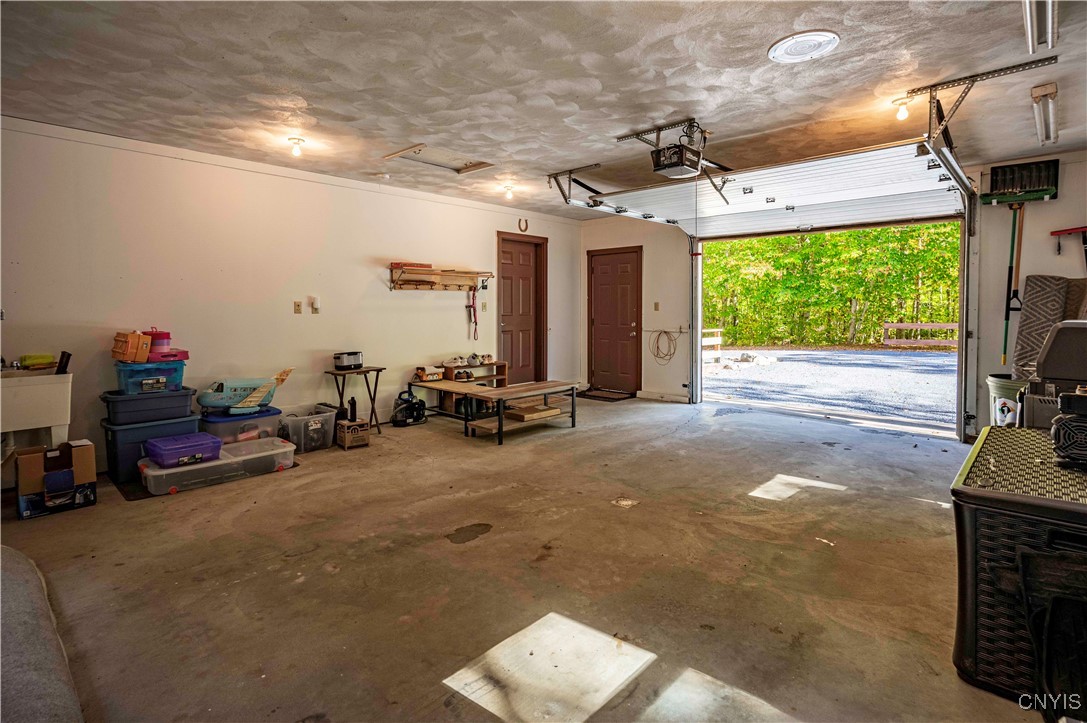 2414 South Shore Road Webb, NY 13420 - Photo 27 of 34 Attached Garage