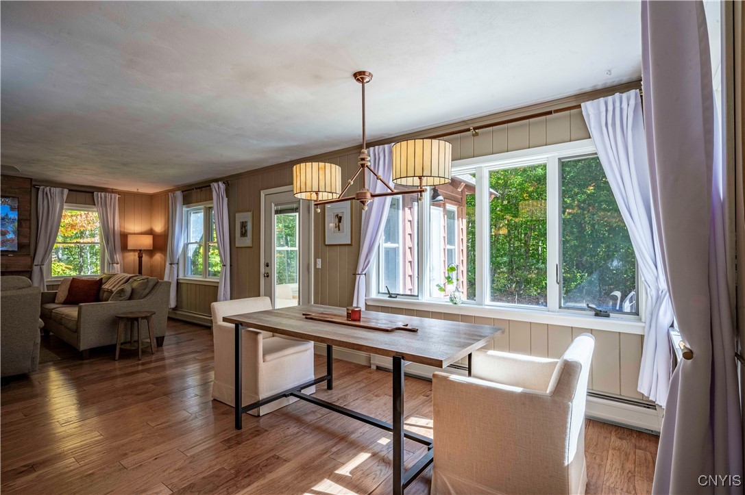 2414 South Shore Road Webb, NY 13420 - Photo 8 of 34 Dining Room with Medya Lighting
